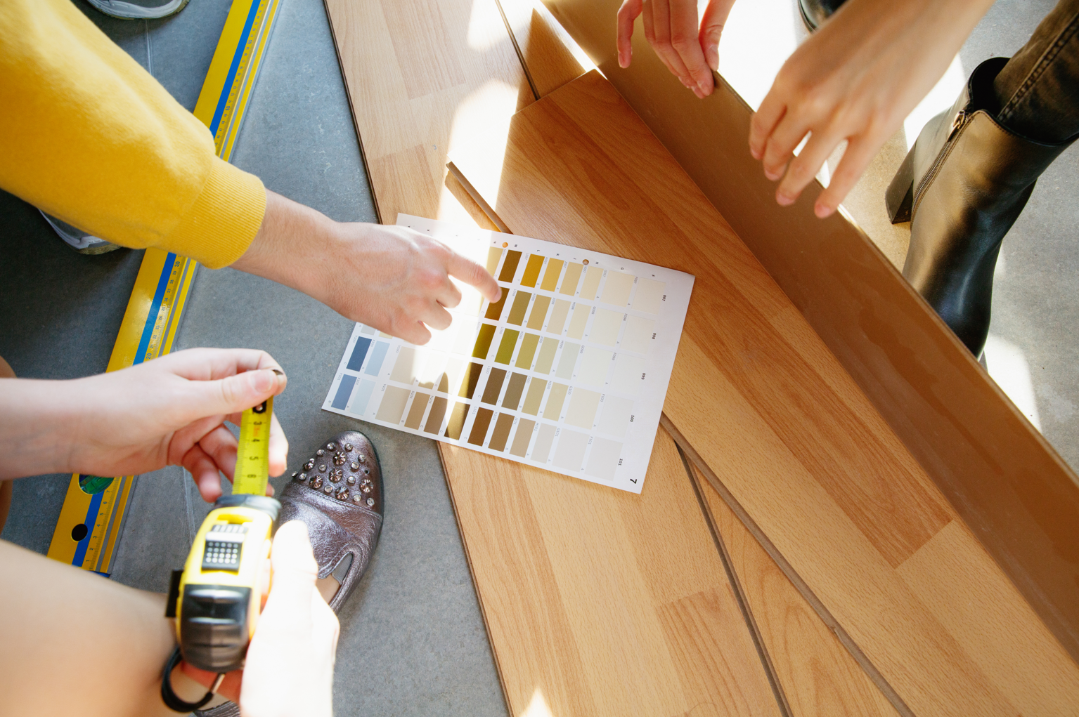 Interior designer working with young couple